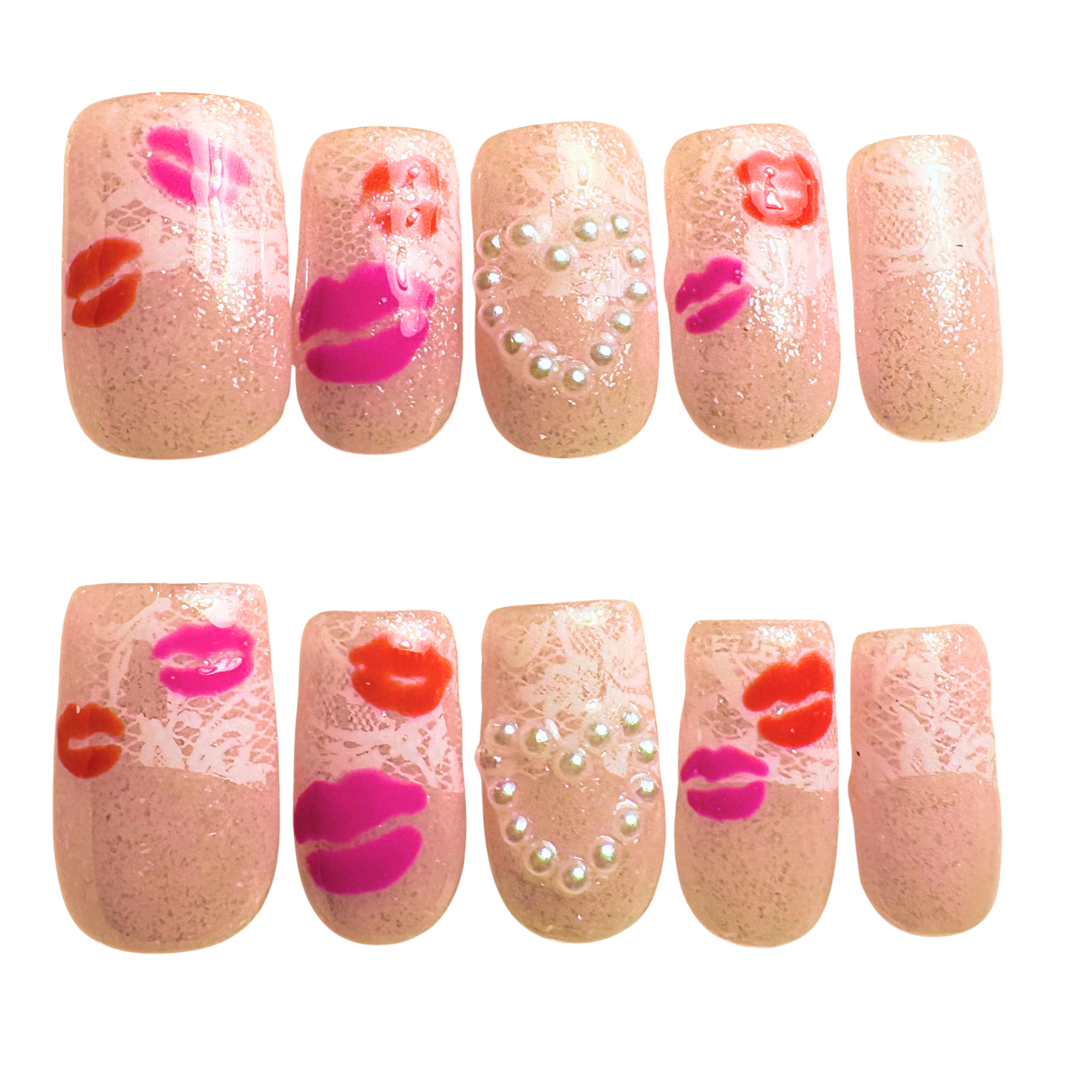 Set of decorative nails with lip designs on a white background